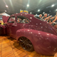 Driver's-side tail shot of the Iron Maven Volvo restomod on the SEMA floor